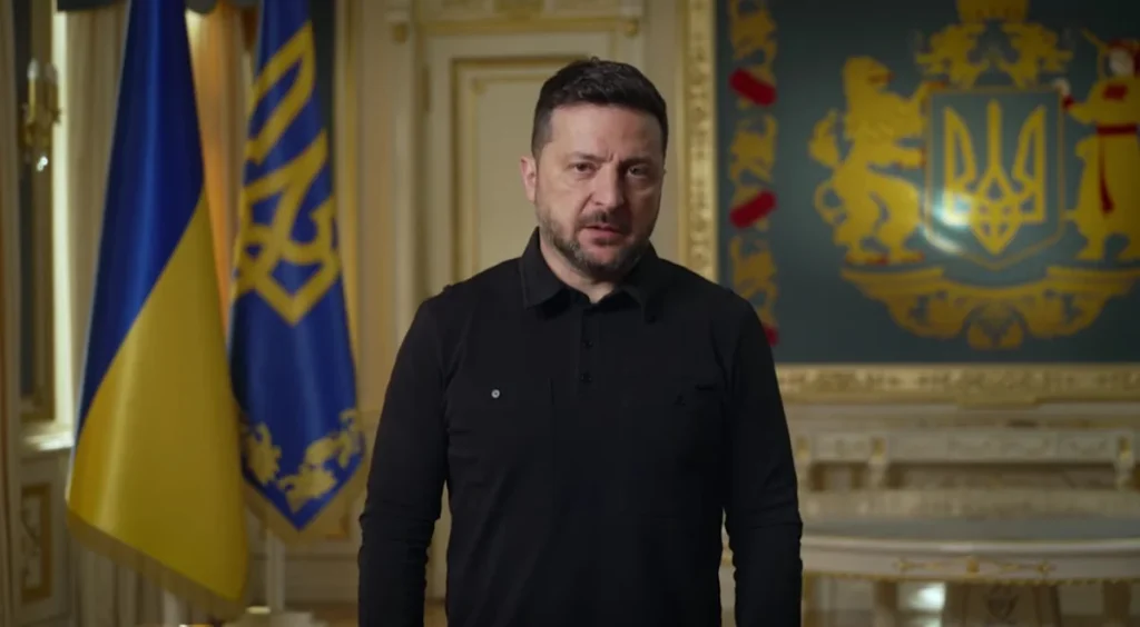 Президент Володимир Зеленський у кабінеті на тлі державного герба України
